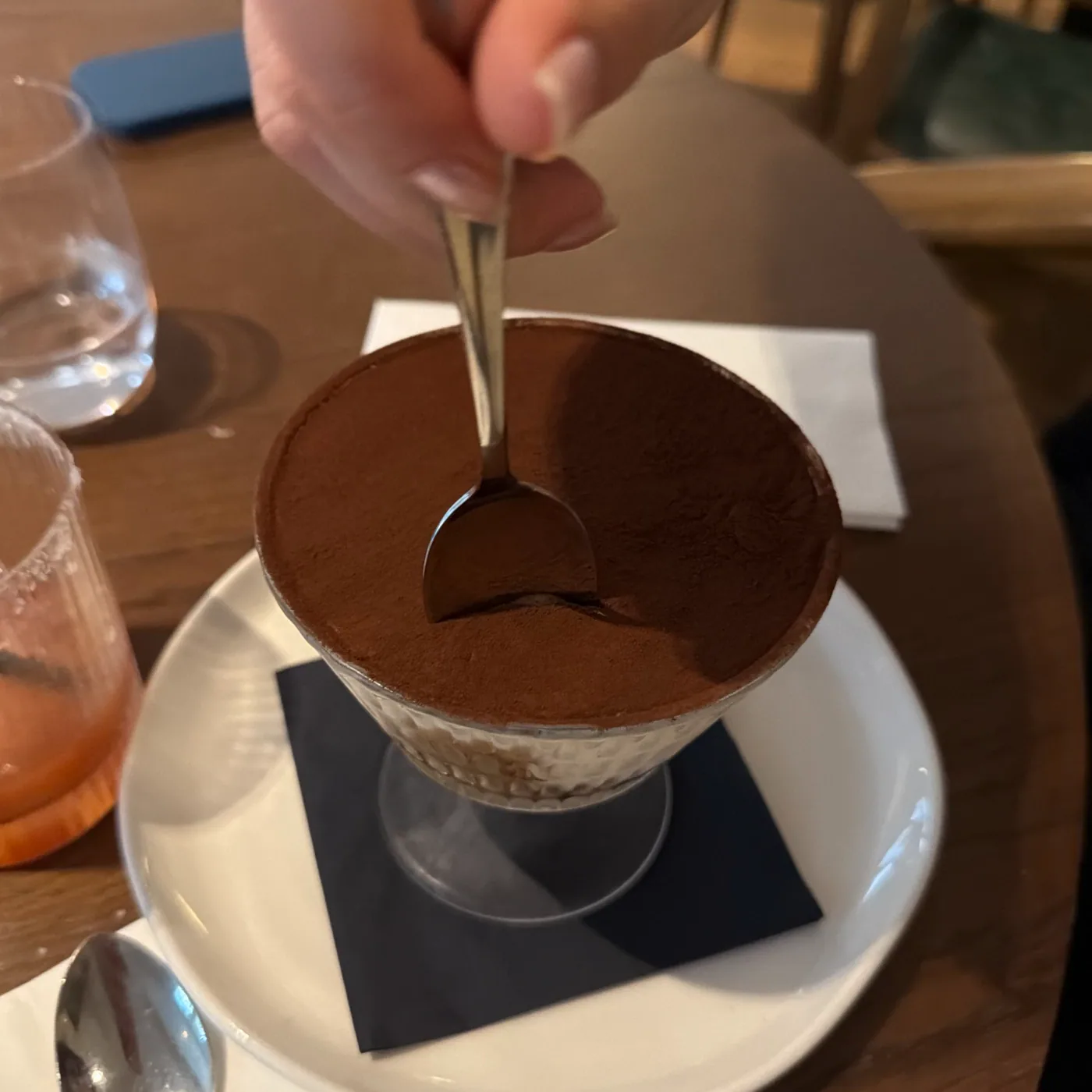 Kendal's tiramisu dusted with cocoa in a glass at Kendal Street Kitchen